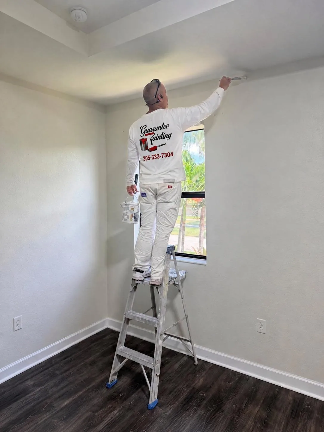 Professional interior wall painting. Illustrative stock photo.