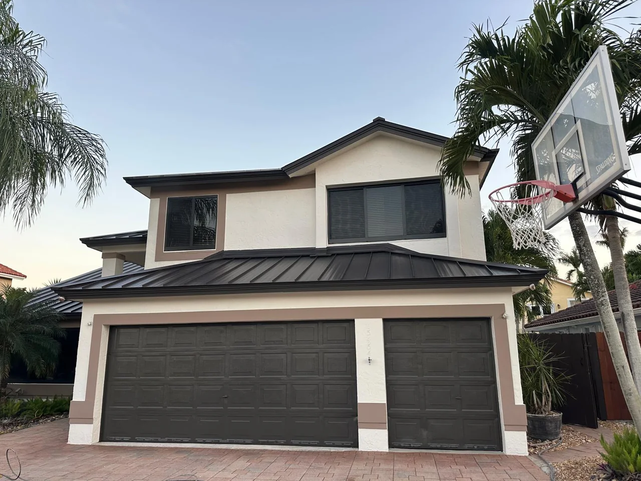 Residential facade and garage painting project.